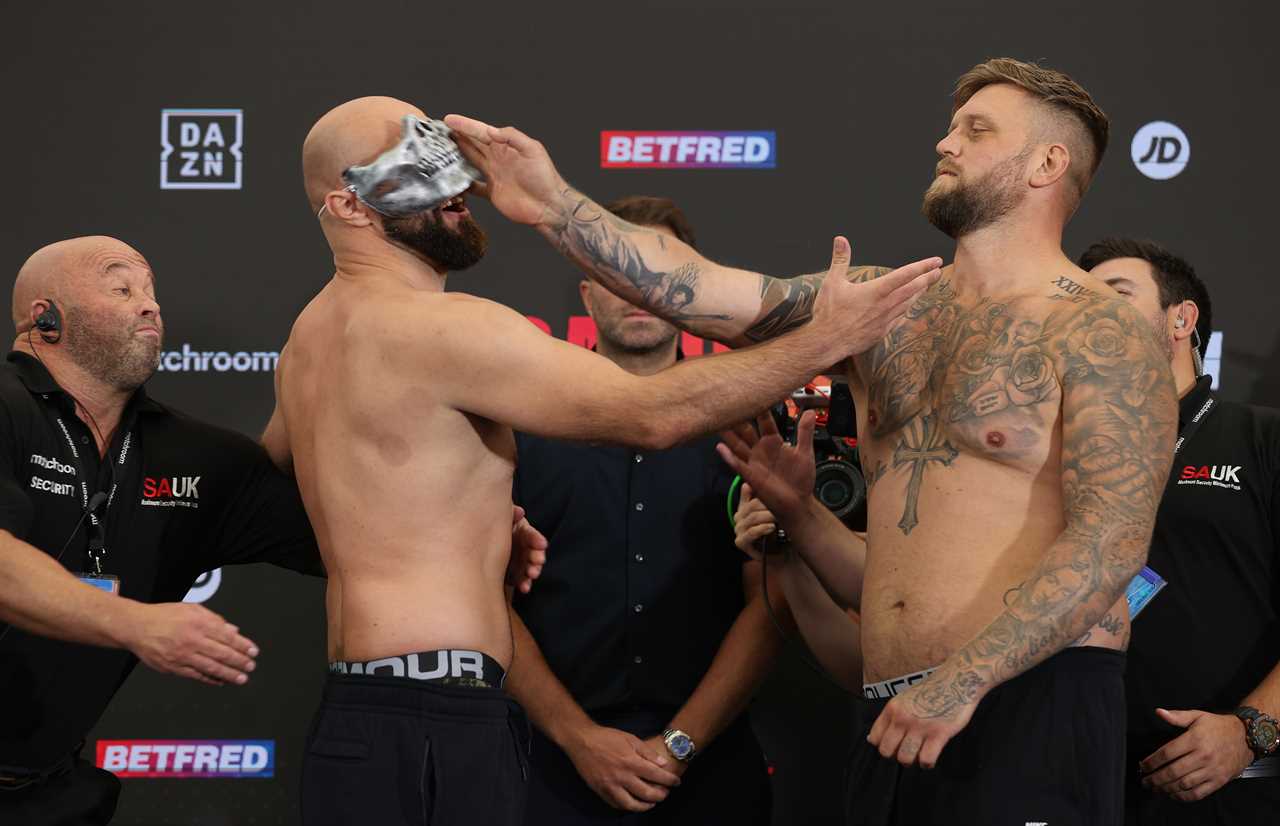 Alen Babic and Mark Bennett engage in a SLAP fight at weighin, as security forces to intervene and separate the boxers