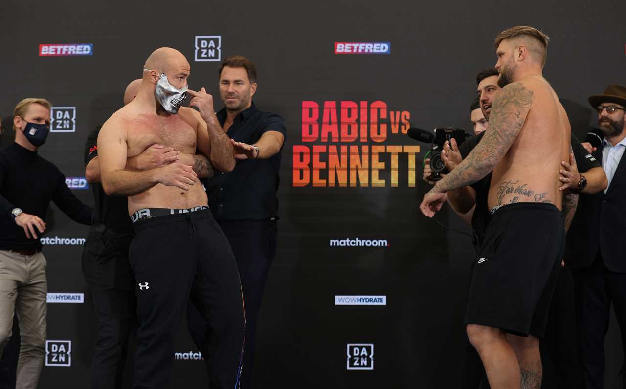 Alen Babic and Mark Bennett engage in a SLAP fight at weighin, as security forces to intervene and separate the boxers