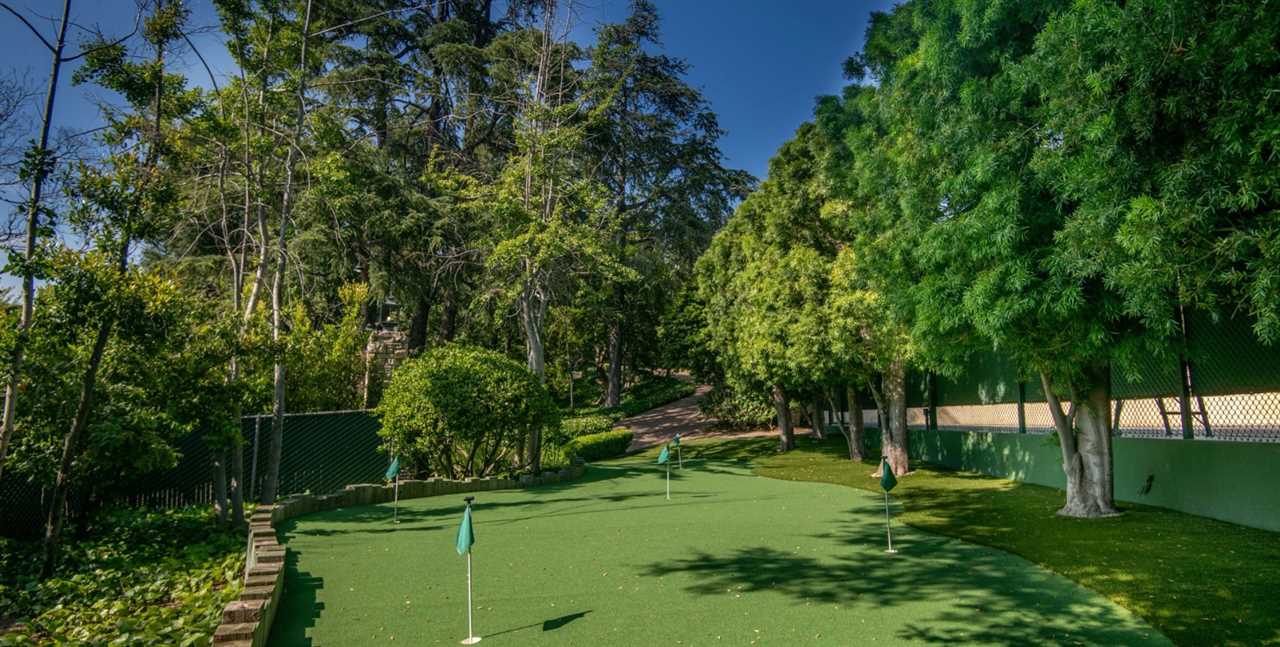 The property has its own putting green