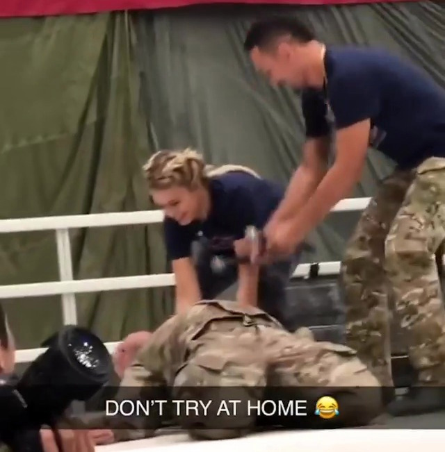 Payge VanZant, ex-UFC star, puts a soldier to sleep with choke hold while army friends in crowd go wild
