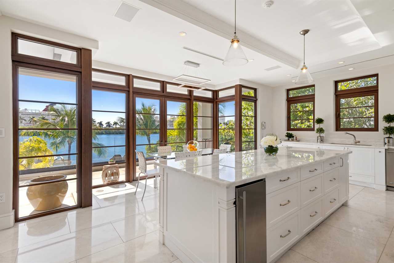 Floyd Mayweather spends $18M to buy a Miami mansion with a private dock and outdoor theater