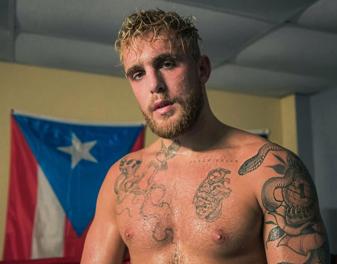Jake Paul asserts that Tyron Woodley's pre-fight training with Floyd Mayweather is a 'detriment' for the former UFC star