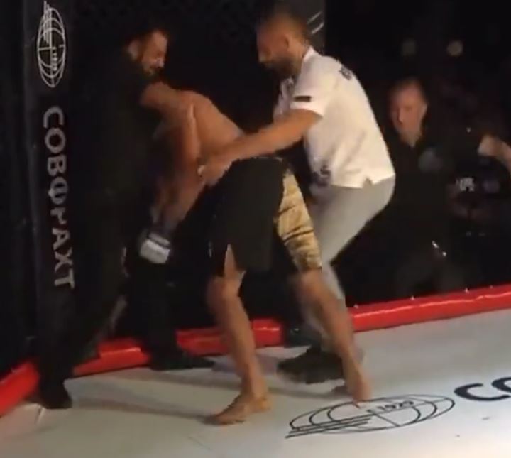 Watch MMA referee choke dazed fighter UNCONCSCIOUS seconds after brutal KO finish and leaves fans stunned with reaction