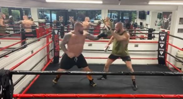 Three weeks after undergoing bicep reattachment surgery, Eddie Hall trains with only his left hand.
