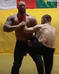 UFC star Conor McGregor demonstrates how he handles Hafthor, the Game of Thrones deadlift record holder, while sparring