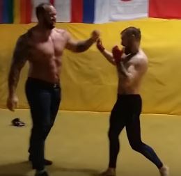 UFC star Conor McGregor demonstrates how he handles Hafthor, the Game of Thrones deadlift record holder, while sparring