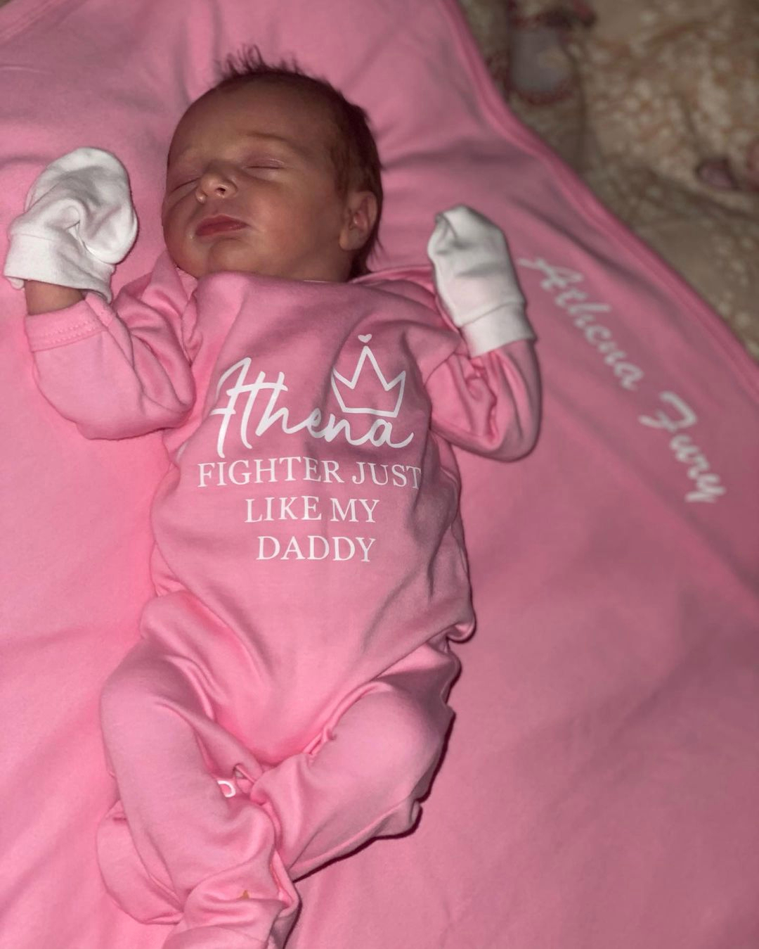 After Tyson Fury's brave infant returns from hospital, Athena, Tyson Fury’s daughter, wears a 'fighter like my daddy' outfit.