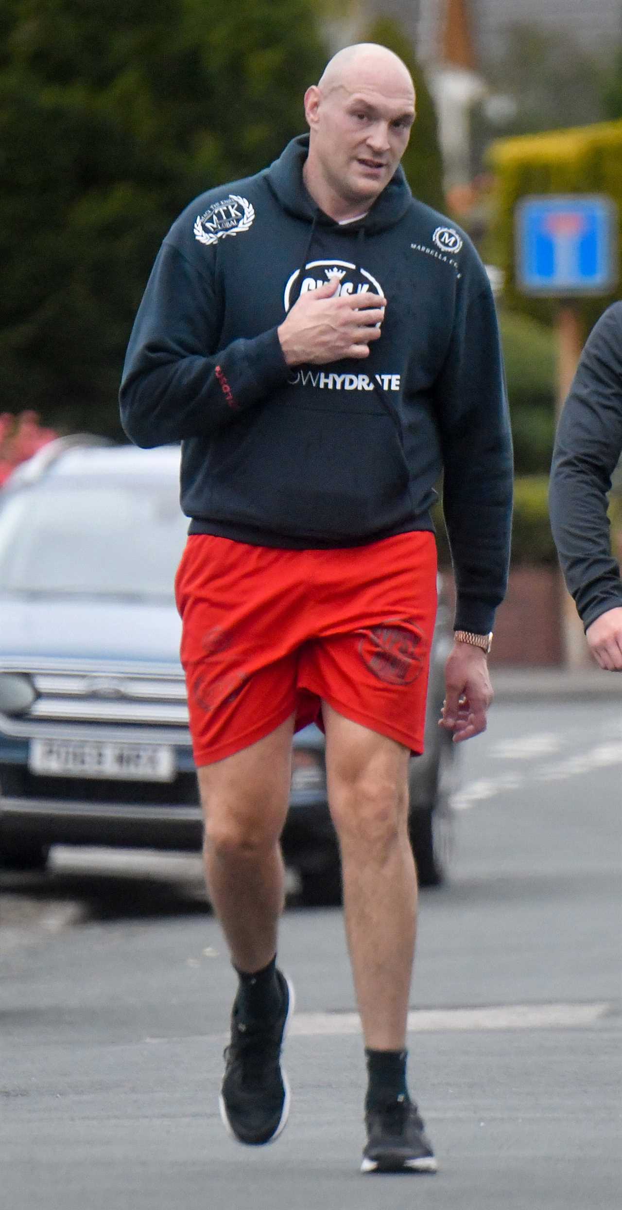 Tyson Fury was spotted following morning run, as he trains to fight Deontay Wilder after his daughter's hospital return.
