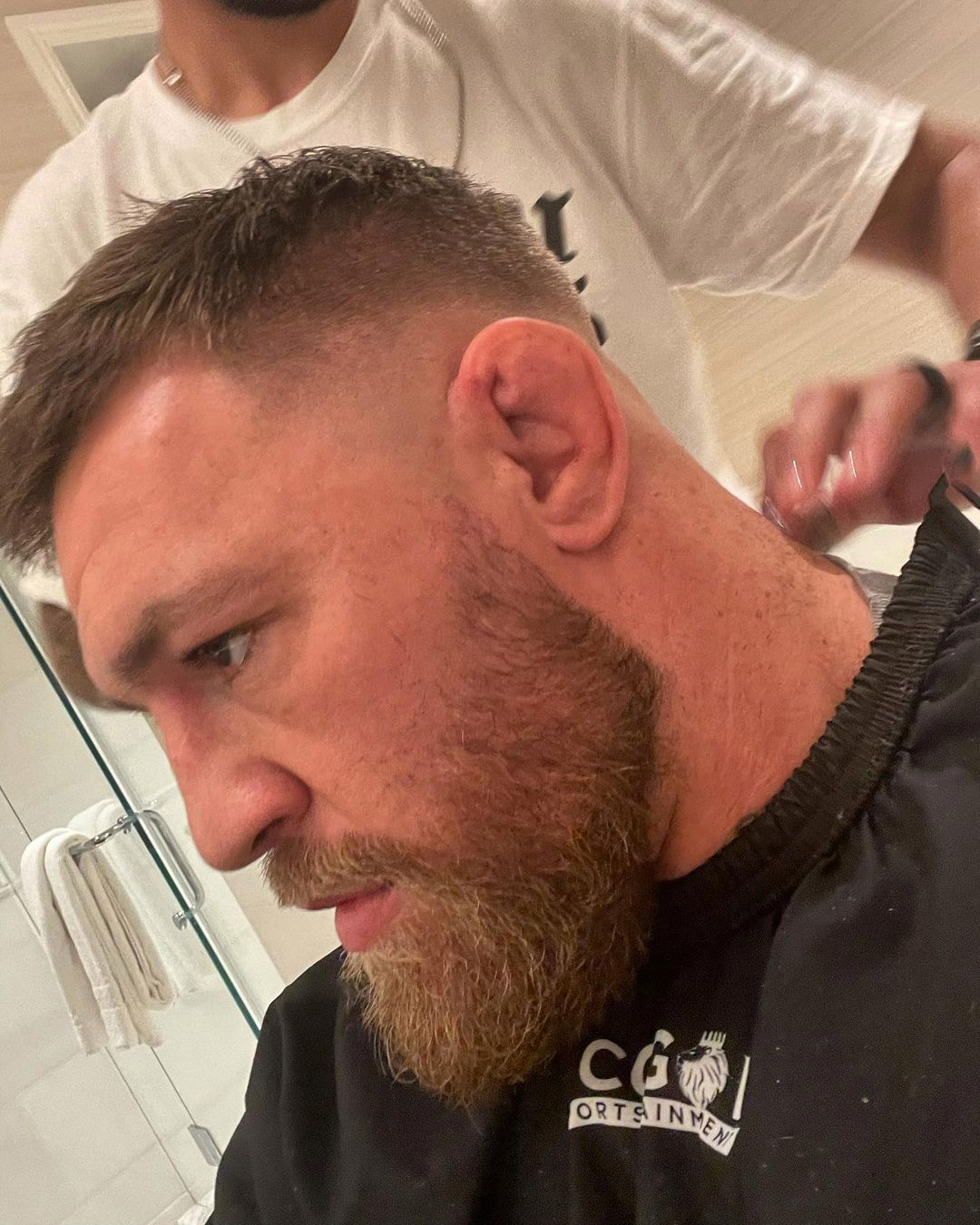 Conor McGregor's new hair looks after a trim. UFC star Conor McGregor returns to the gym after undergoing surgery on a broken leg