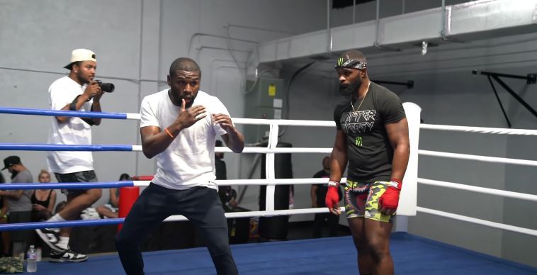 Tyron Woodley reveals his feelings about Floyd Mayweather's training, but Jake Paul claims that he has no excuses for the fight.