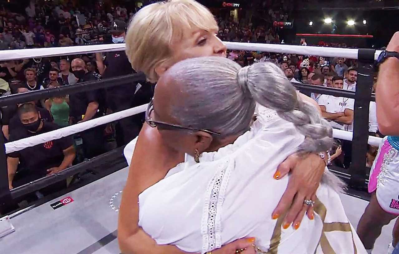 After their sons' brutal fight, Jake Paul and Tyron Woodley hugged their mothers in the ring.