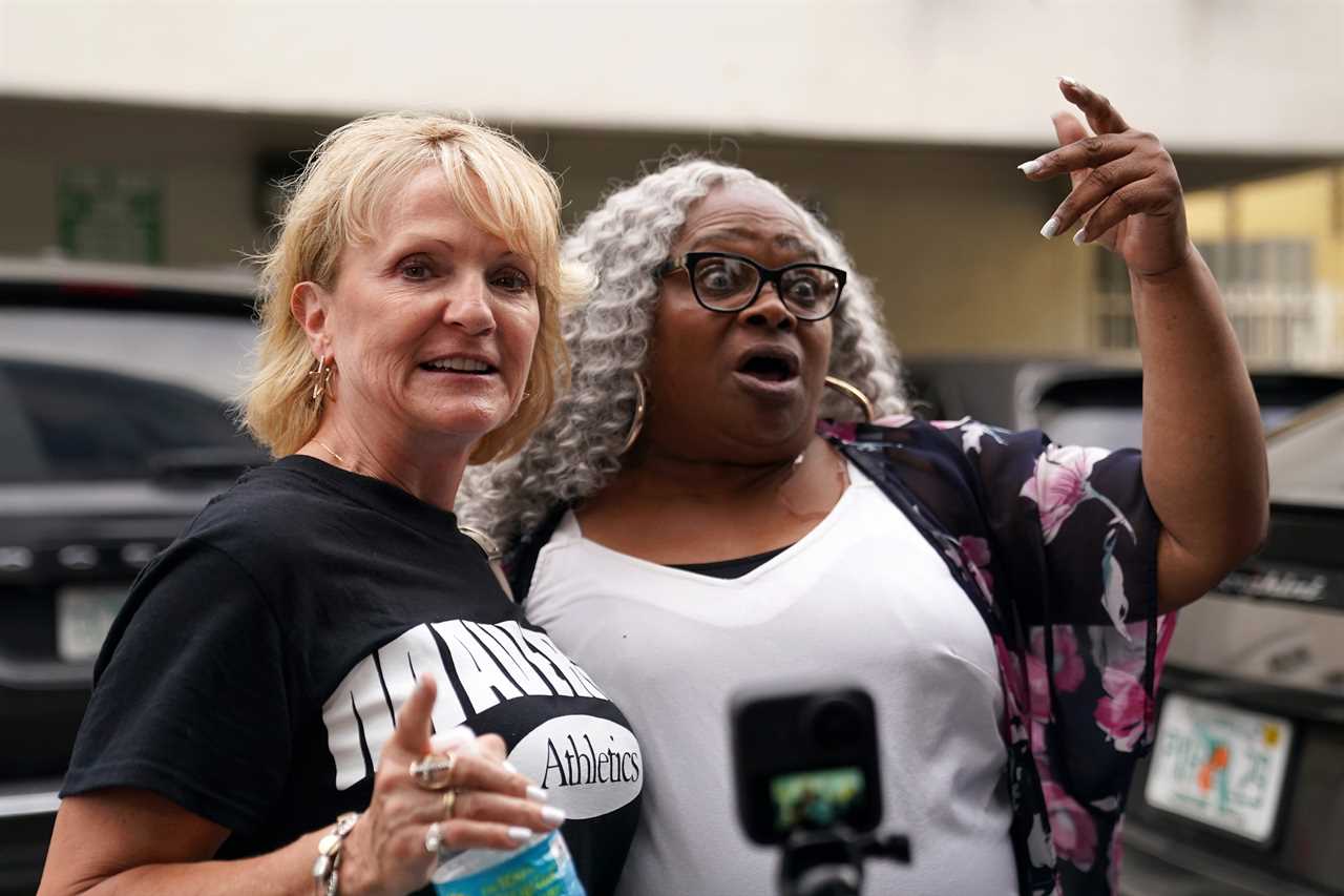 After their sons' brutal fight, Jake Paul and Tyron Woodley hugged their mothers in the ring.