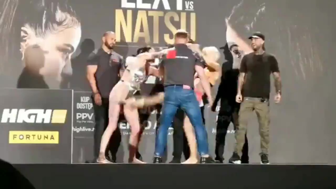 Watch as Ewa Brodnicka, MMA fighter, shoves SEX TOY into the face of her opponent in a pre-fight standoff