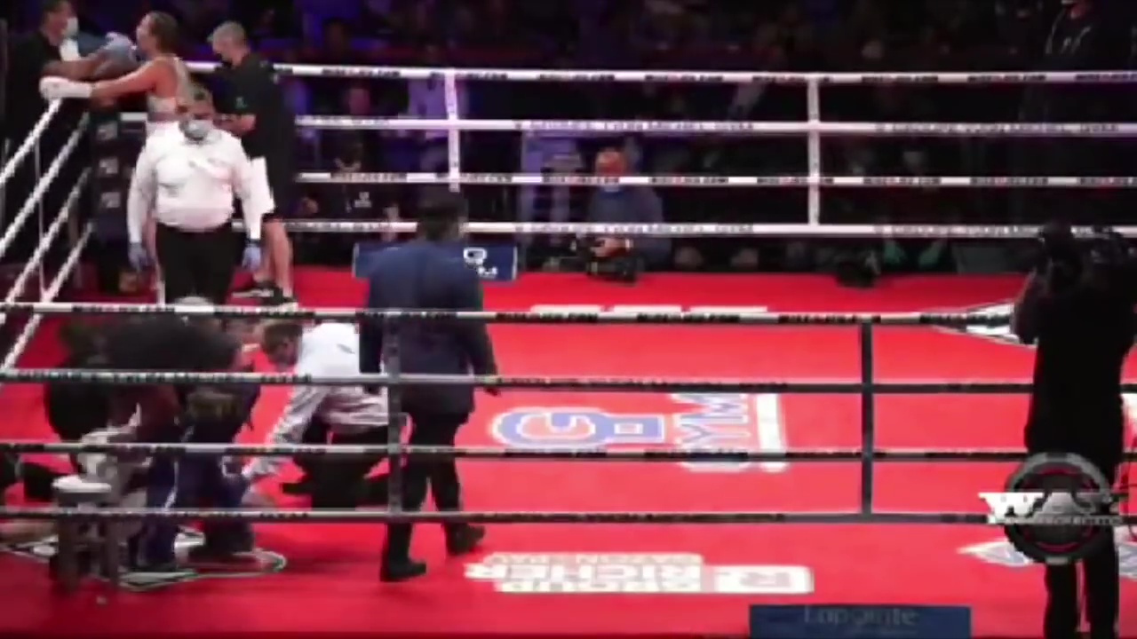 Boxer, 18 years old, is in critical condition after being knocked down cold and taken on stretcher in a'very rare' incident
