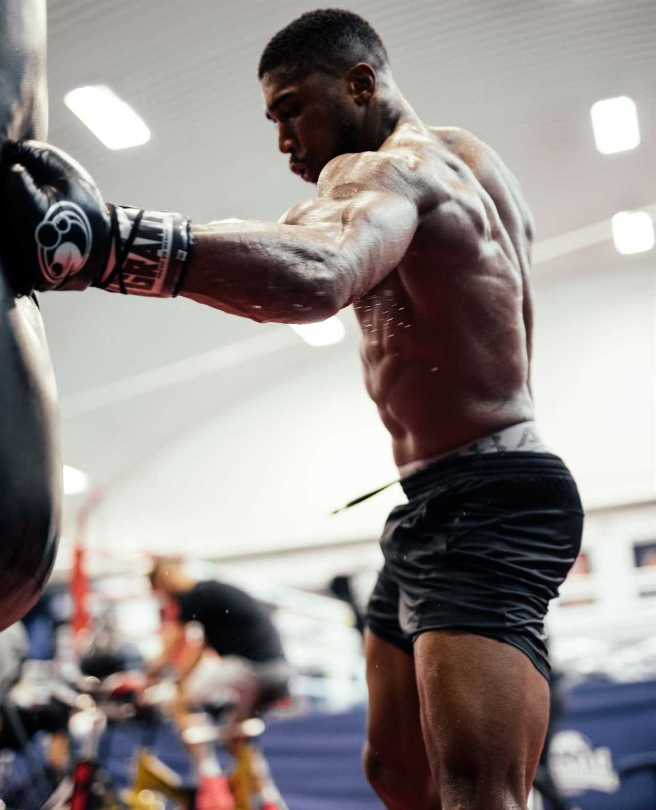 Anthony Joshua looks slimmer, but his biceps are still bulging from a weight loss before Oleksandr Usyk fight