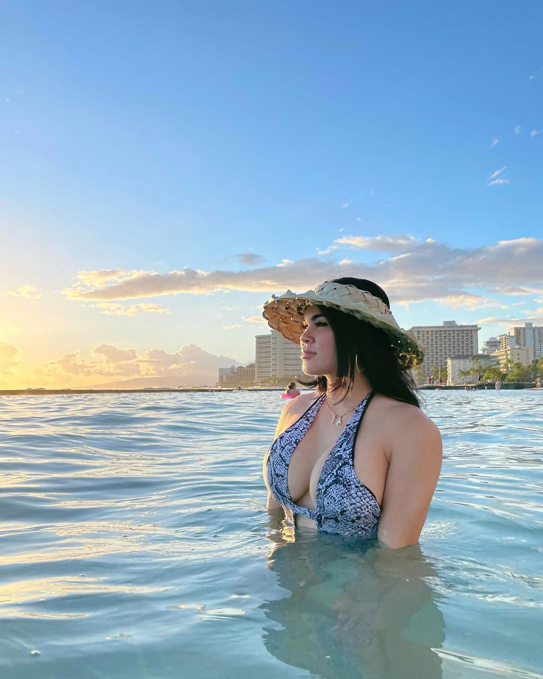 Rachael Ostovich, ex-UFC star, shows off her beautiful bikini body in revealing one piece while posing at sea on Instagram