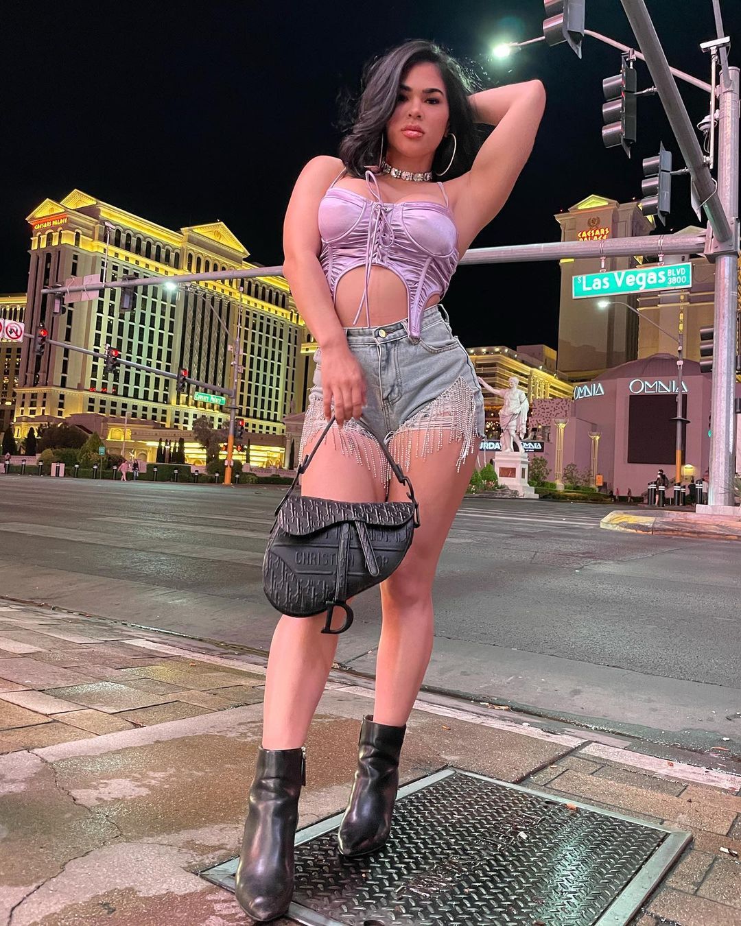 Rachael Ostovich, ex-UFC star, shows off her beautiful bikini body in revealing one piece while posing at sea on Instagram