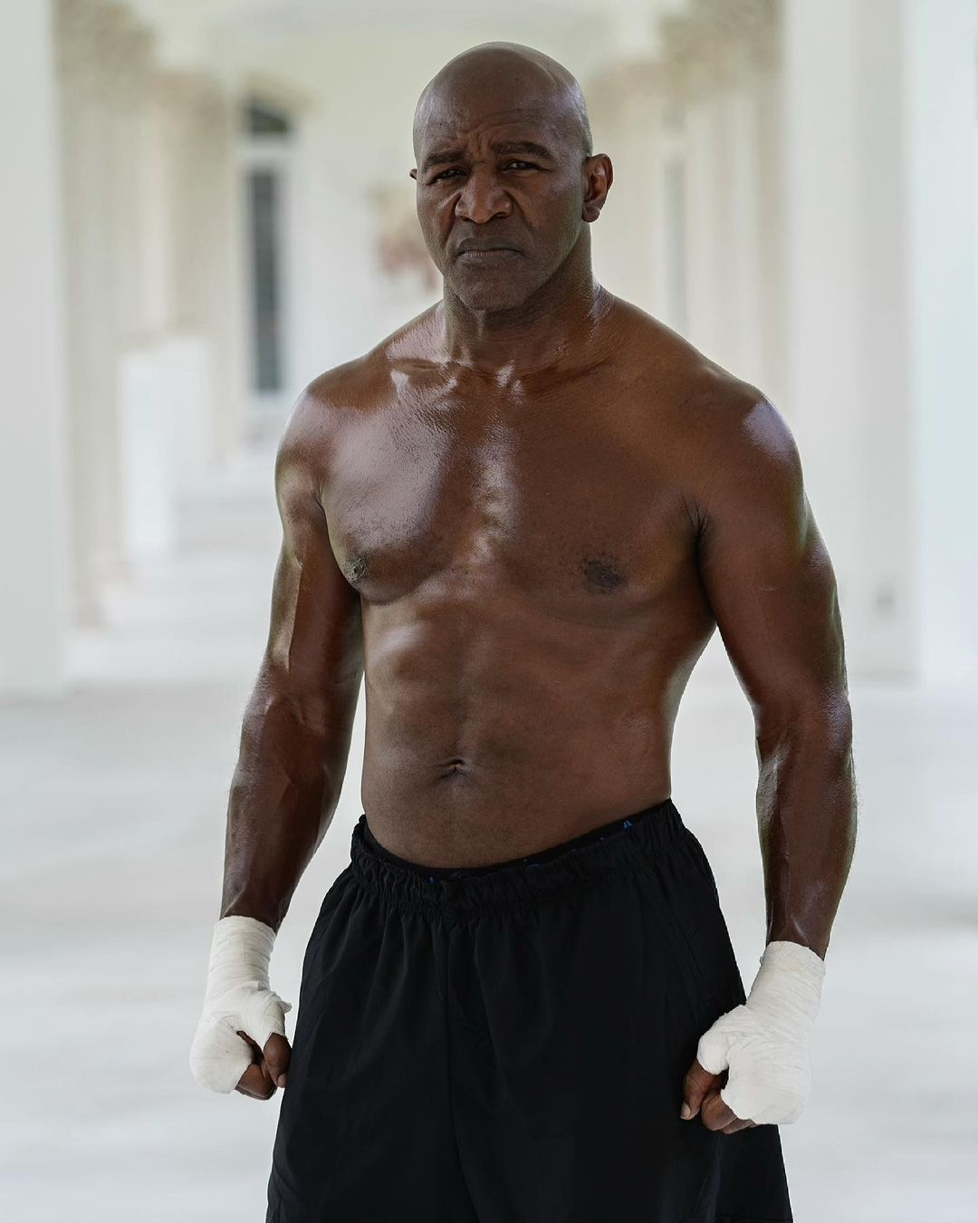 Evander Holyfield's 58-year-old comeback shouldn't happen, Michael Bisping says.