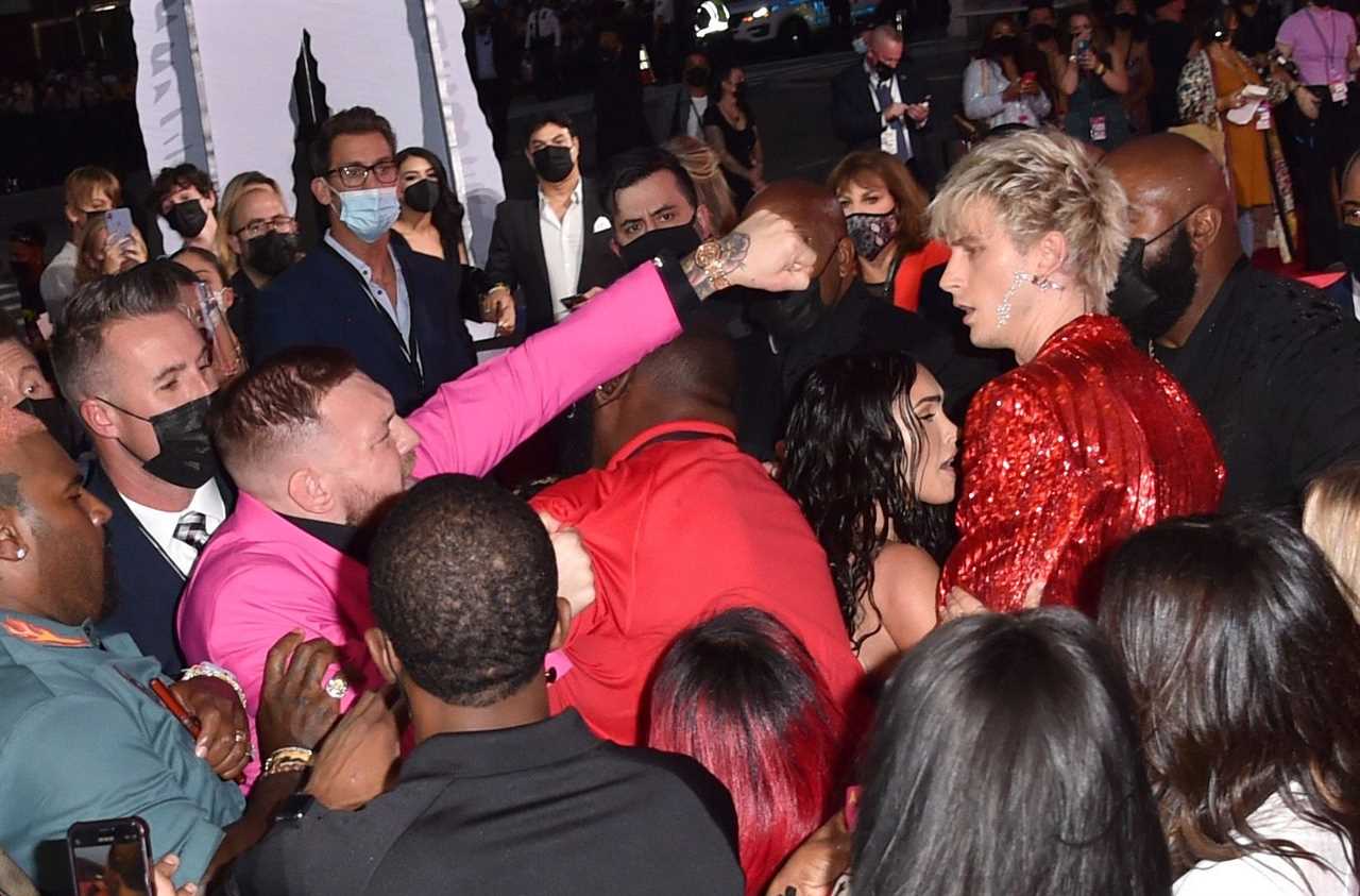 After a red carpet confrontation at MTV VMAs, Conor McGregor, UFC's star, labels Machine Gun Kelly a Vanilla Ice white boy rapper.