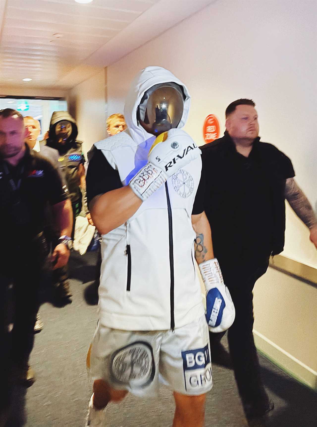 Oleksandr Usyk presents Elon Musk a bizarre, space-inspired ringwalk helmet that was worn by Anthony Joshua during his entrance to the fight