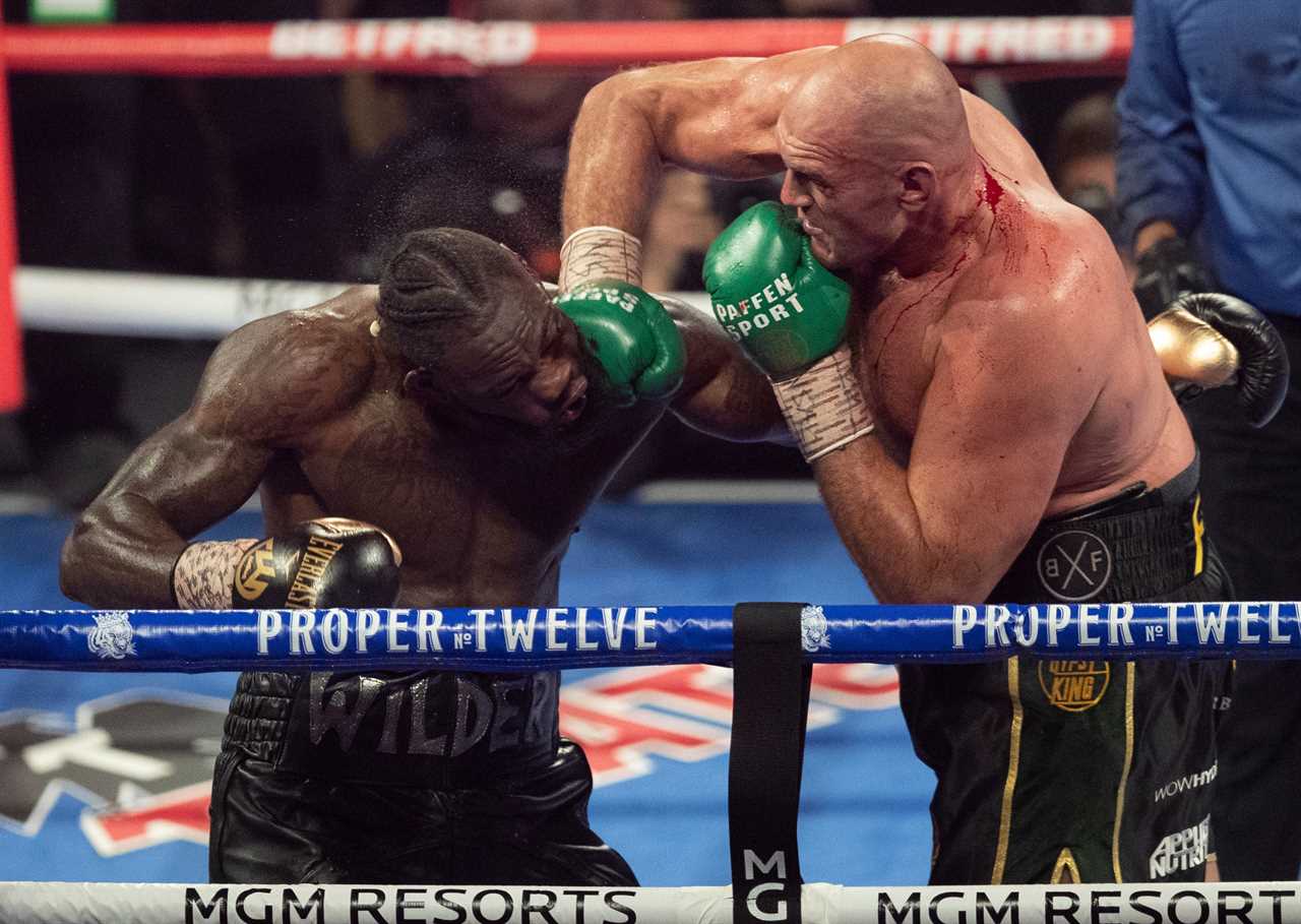 Tyson Fury brilliantly hits back against Deontay Wilder’s'steamtrain' post with a brutal snap of him punching his rival in the face