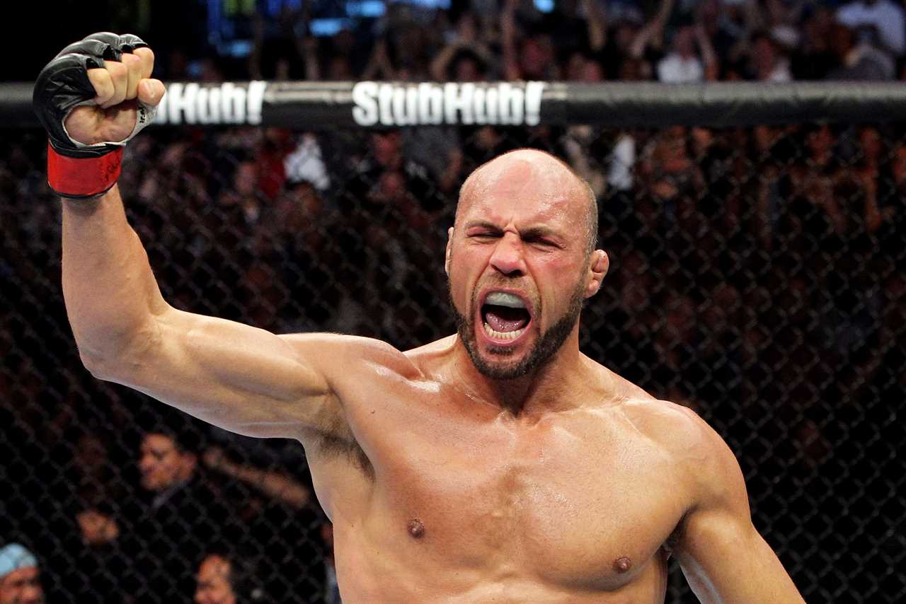 Michael Bisping unveils 'MMA Mount Rushmore', including Anderson Silva and Georges St-Pierre, the first UFC champions.