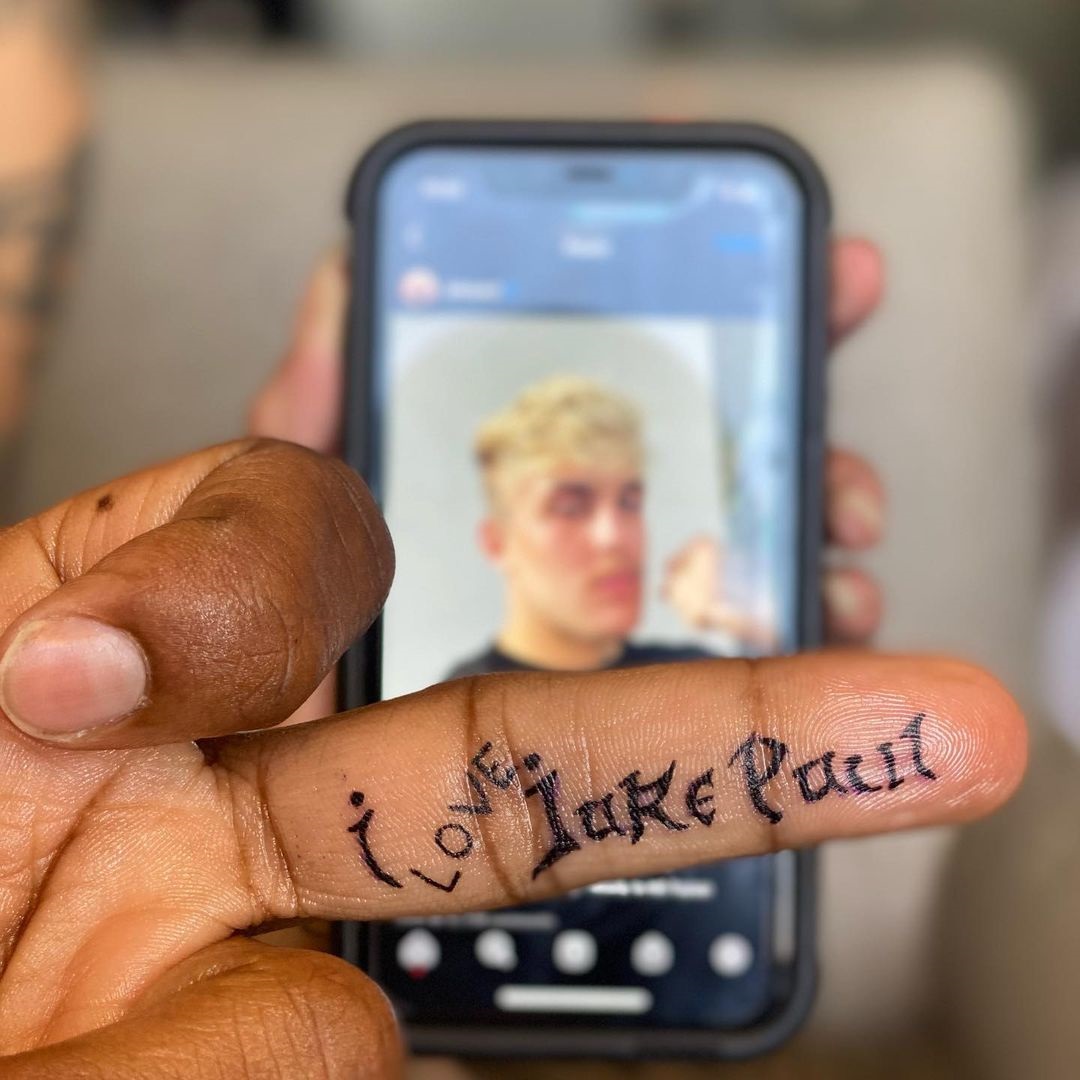 Tyron Woodley was convinced by Jake Paul that he could change the 'I Love Jake Paul Tattoo' on his finger.