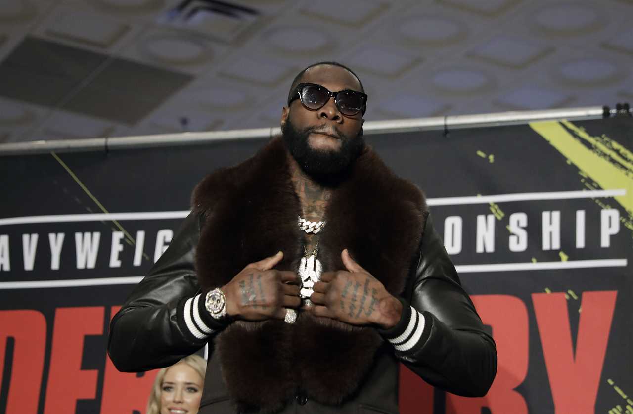Deontay Wilder and Tyson Fury face off in fashion with custom suits, gold slippers, and diamond jewellery