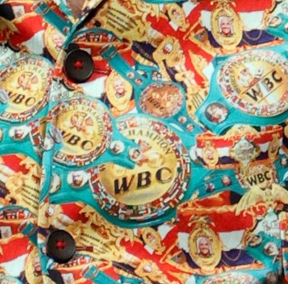 Tyson Fury's bespoke suit is decorated with WBC belts to taunt Deontay Wilder in advance of his fight
