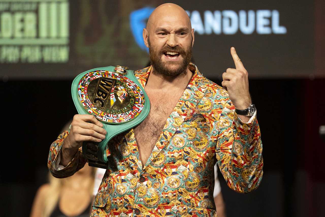 After being asked if Tyson Fury is ready to face Deontay Wester, Fury jokes about staggering around and pretends to fall into a bin.