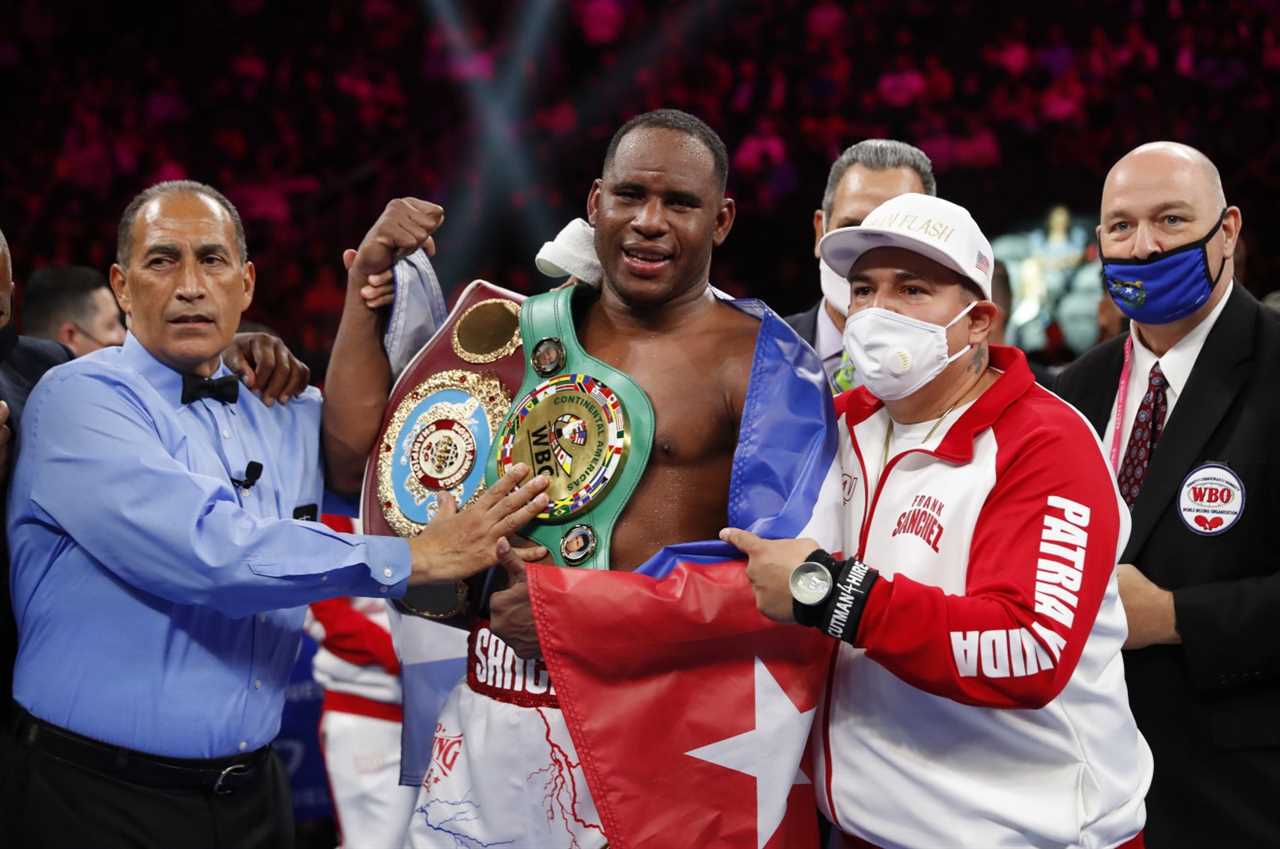 As Fury vs Wilder crowd gasps, watch Frank Sanchez hit Efe Ajagba in a controversial moment.