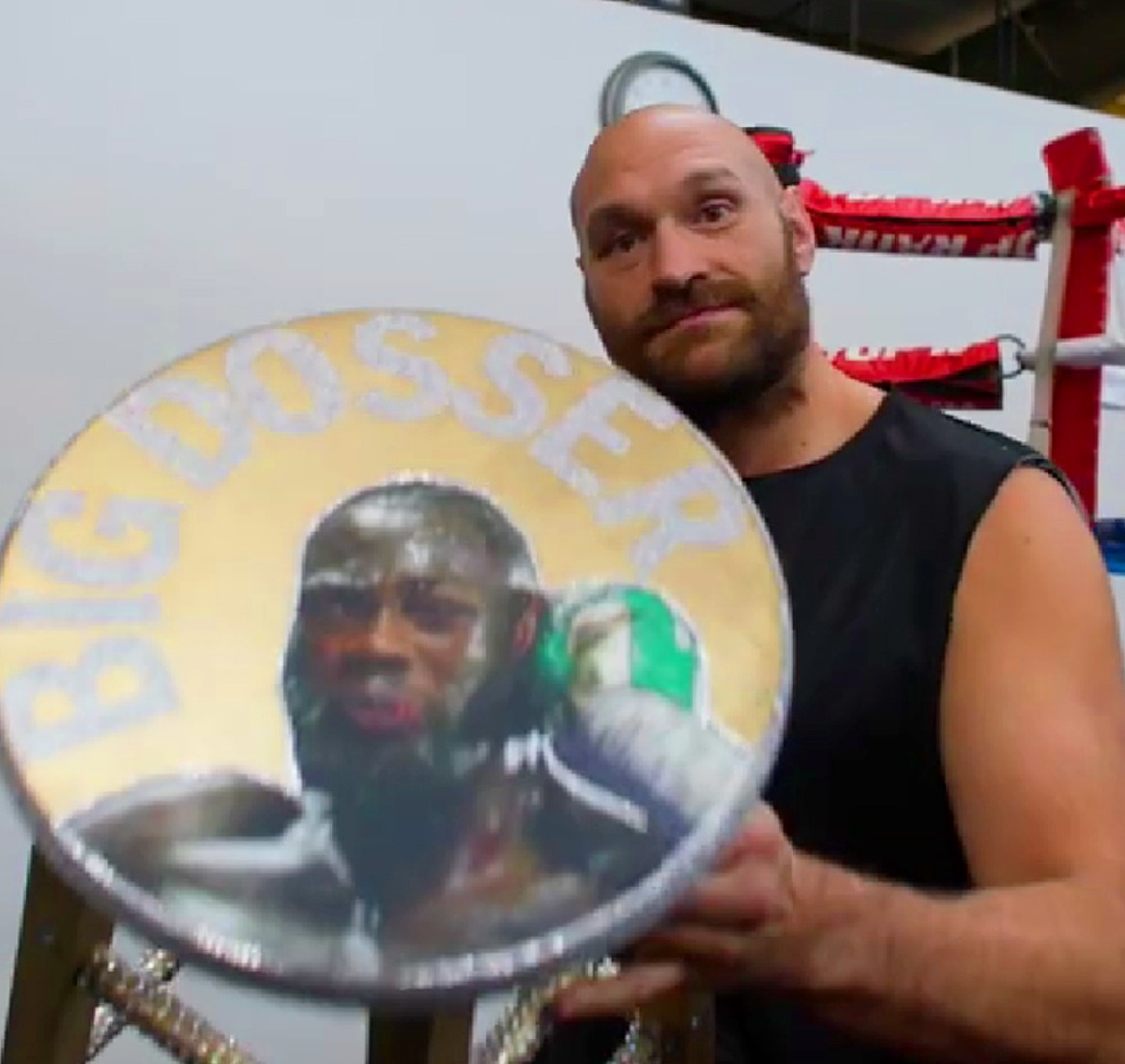 Tyson Fury's hilarious STOOL for Deontay wilder fight with Big Dosser. Photo of him punching his rival on it