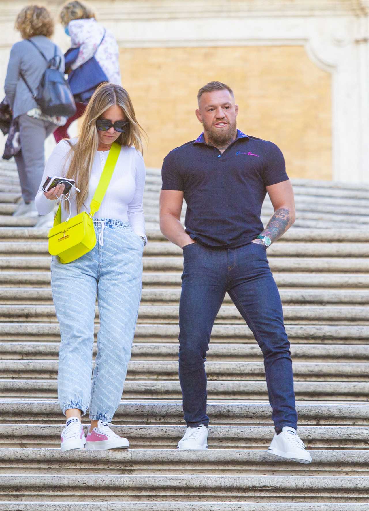 After being attacked by Rome fans, Conor McGregor was surrounded by a massive security team as he and Dee Devlin went to the shops.