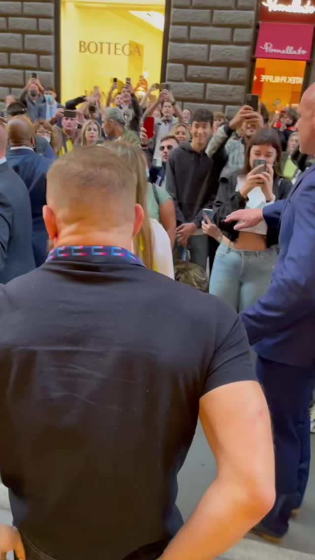 After being attacked by Rome fans, Conor McGregor was surrounded by a massive security team as he and Dee Devlin went to the shops.