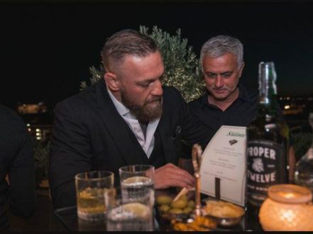 Conor McGregor drinks whiskey with Jose Mourinho after UFC star receives Roma shirt from the Vatican.