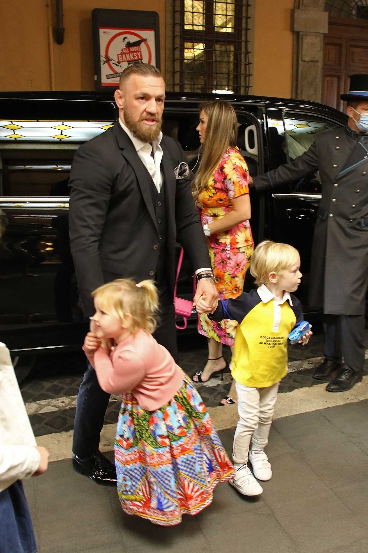 Conor McGregor and Dee Devlin, their fiancee, have a ceremony at the Vatican to mark Rian's christening.