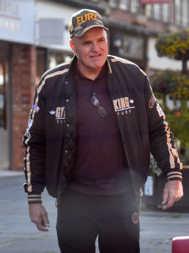 John Fury wears a custom Gypsy King jacket to show off Tyson's achievements in his career after the sensational Deontay wilder KO