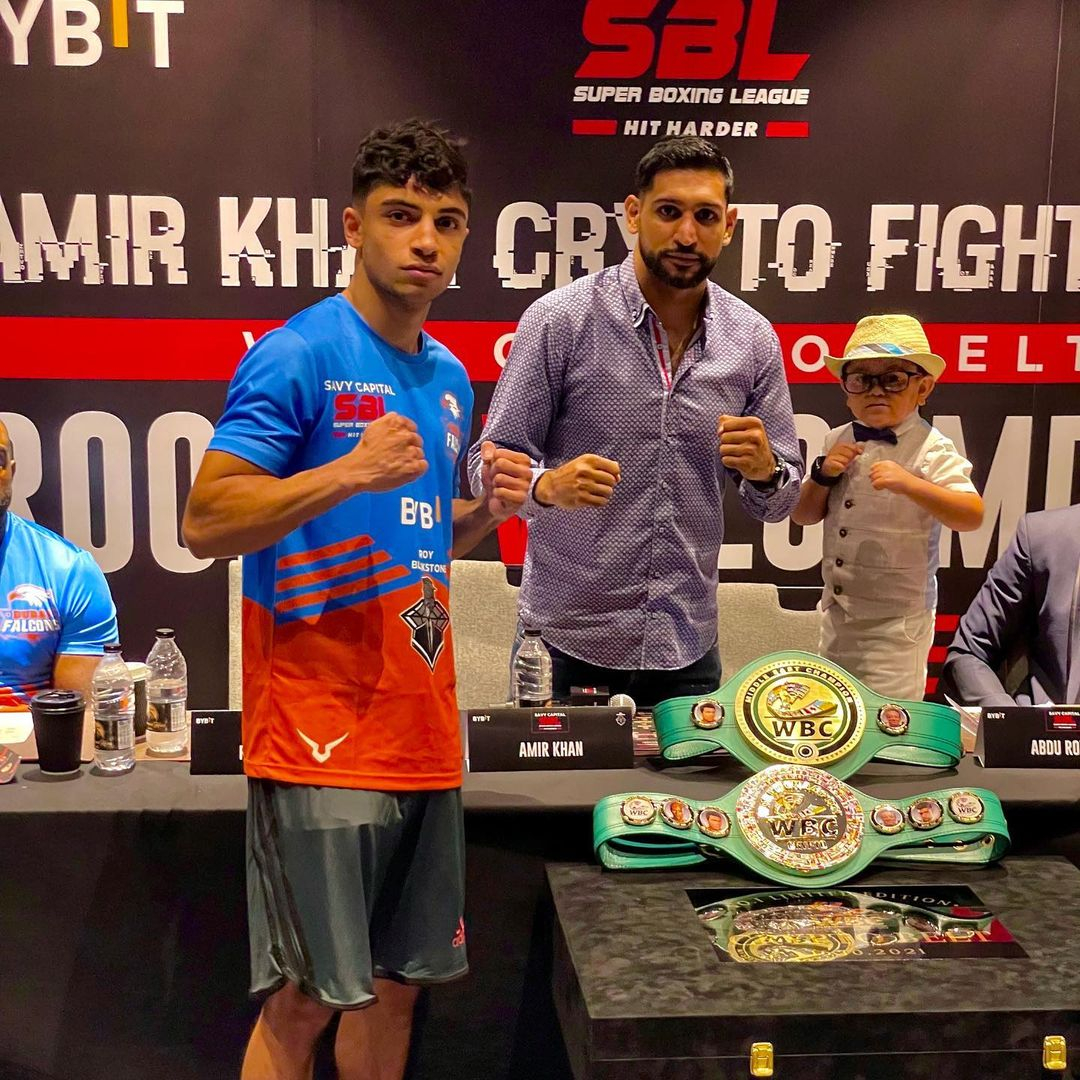 Amir Khan's cousin wins pro debut with a bizarre cryptocurrency card in Dubai. Olympic boxer helps train prospect