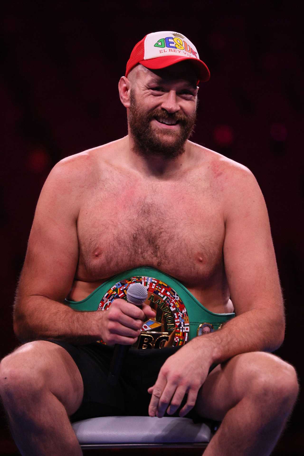 Tyson Fury reacts an old photo of him before he lost a lot of weight, but says that it's his '100% body of peak male performance.