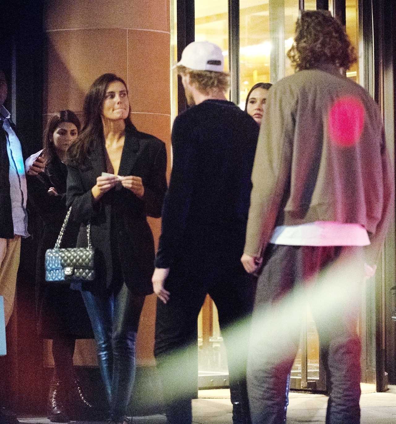 Logan Paul departs Mayfair's chic restaurant to meet mystery women before heading to Tape Nightclub, a celebrity hotspot.