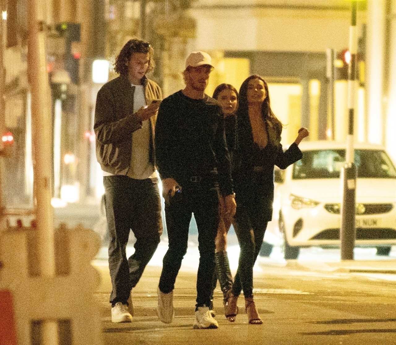 Logan Paul departs Mayfair's chic restaurant to meet mystery women before heading to Tape Nightclub, a celebrity hotspot.