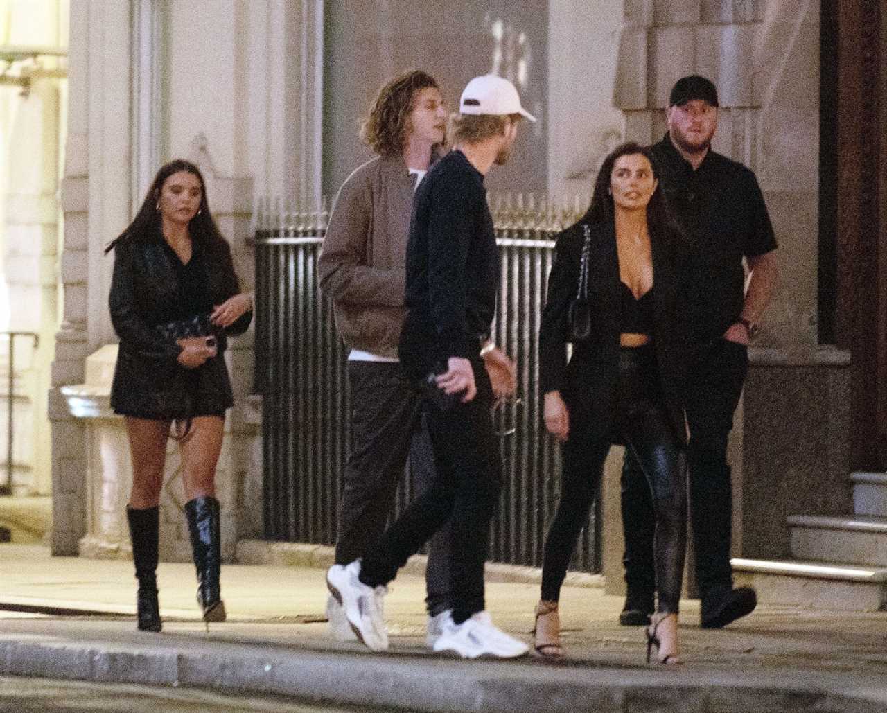 Logan Paul departs Mayfair's plush restaurant to meet mystery women before heading to Tape Nightclub, a celebrity hotspot.