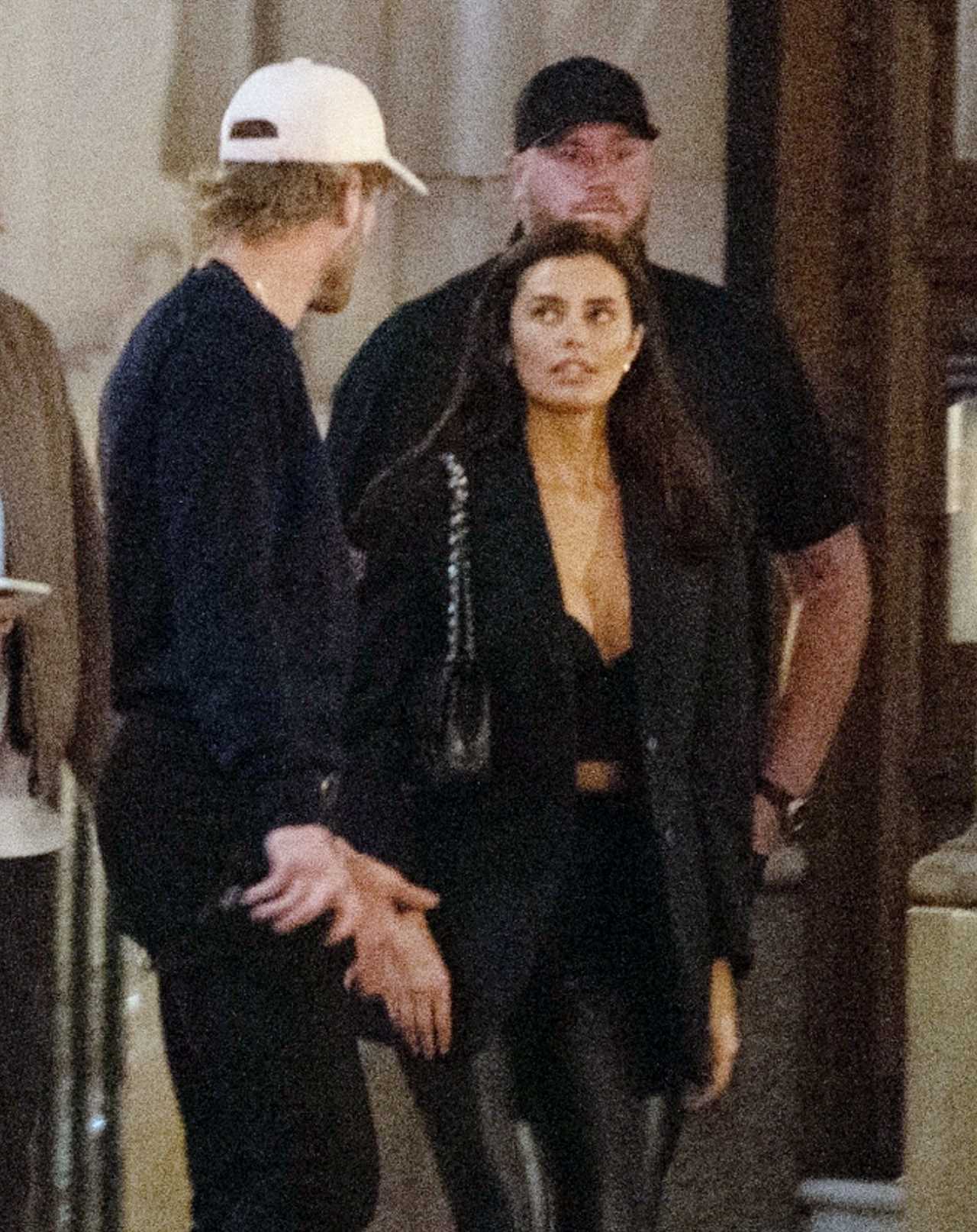Logan Paul departs Mayfair's plush restaurant to meet mystery women before heading to Tape Nightclub, a celebrity hotspot.