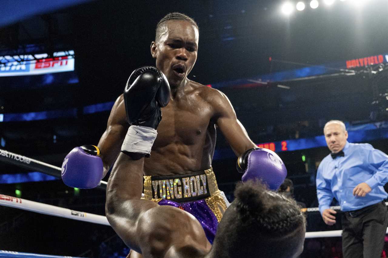 Evander Holyfield's son Evan delivers a monster KO to cheered by boxing legends ringside