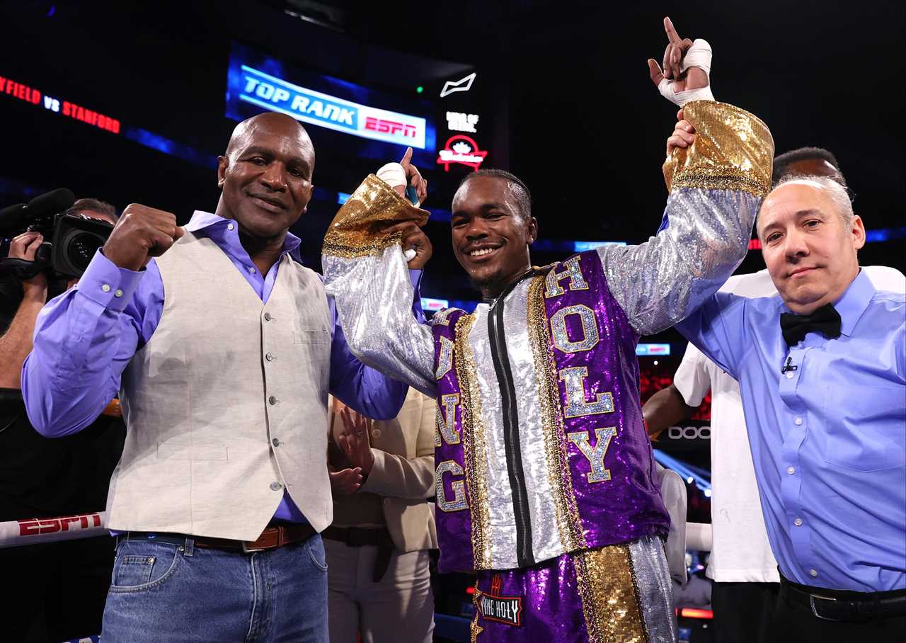Evander Holyfield's son Evan delivers a monster KO to cheered by boxing legends ringside