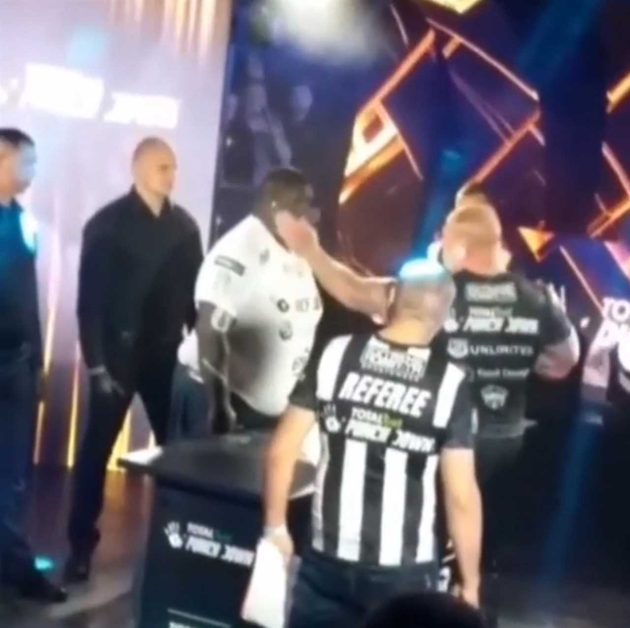 Officials have to assist Brutal Moment 25st MMA fighter who is knocked out by a rival in a savage slapping match.