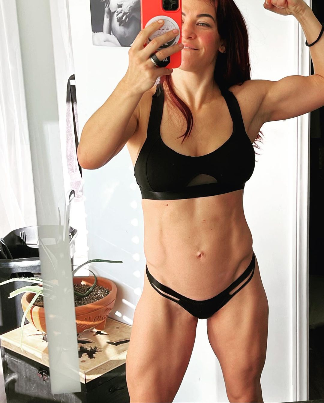Miesha Tate, UFC legend, shows off her incredible body at age 35 after having two children.
