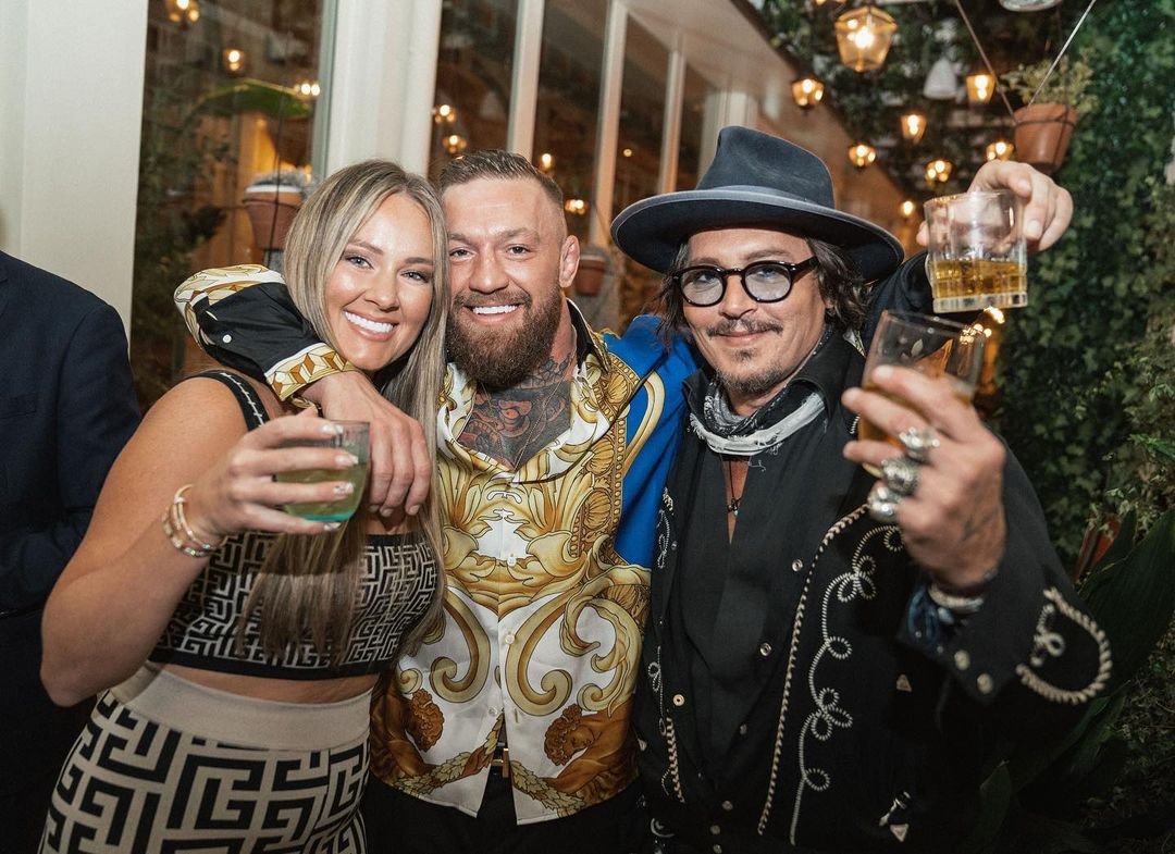 Johnny Depp and Conor McGregor share a whiskey when UFC star Dee Devlin meets 'Pirates of the Caribbean actor' in Rome.