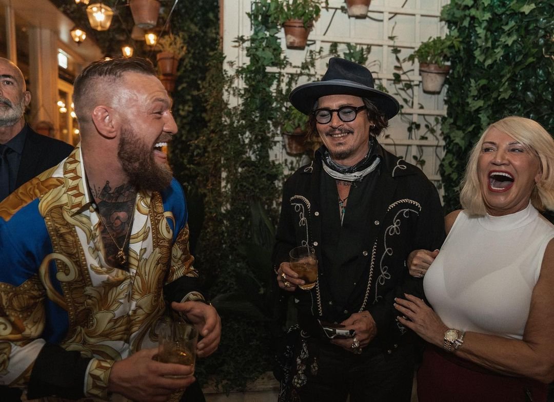 Johnny Depp and Conor McGregor share a whiskey when UFC star Dee Devlin meets 'Pirates of the Caribbean actor' in Rome.