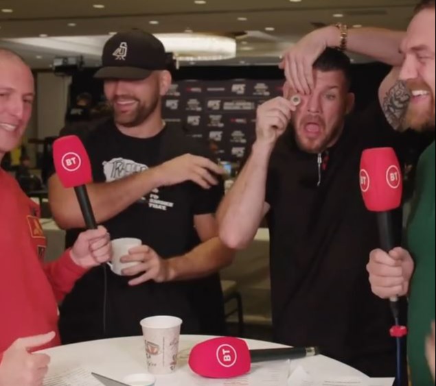 Amazing moment UFC legend Michael Bisping reveals his fake eye during live BT broadcast. It leaves reporter shocked